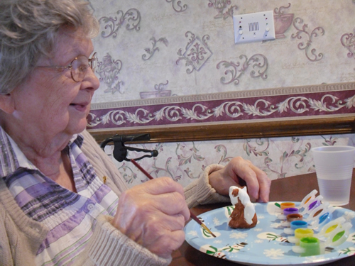 old woman painting