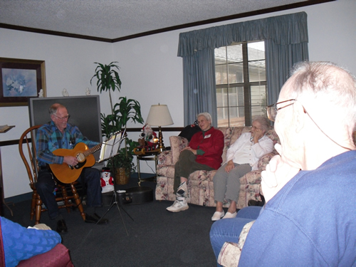 group of elderly people having a meeting