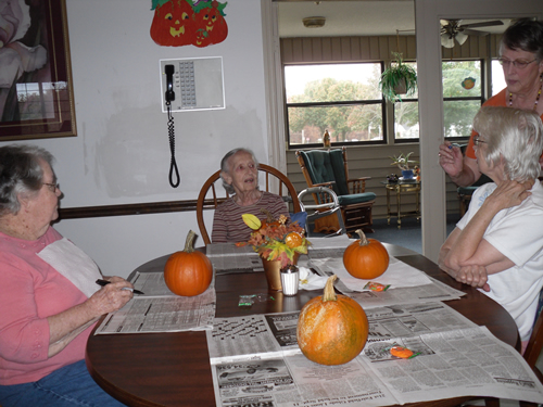 group of elderly women having a discussion