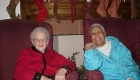 two elderly woman smiling at the camera